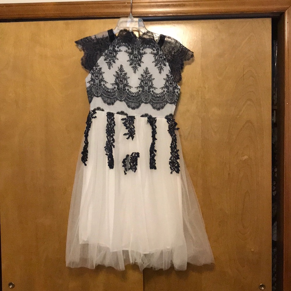 Size medium white with black lace dress